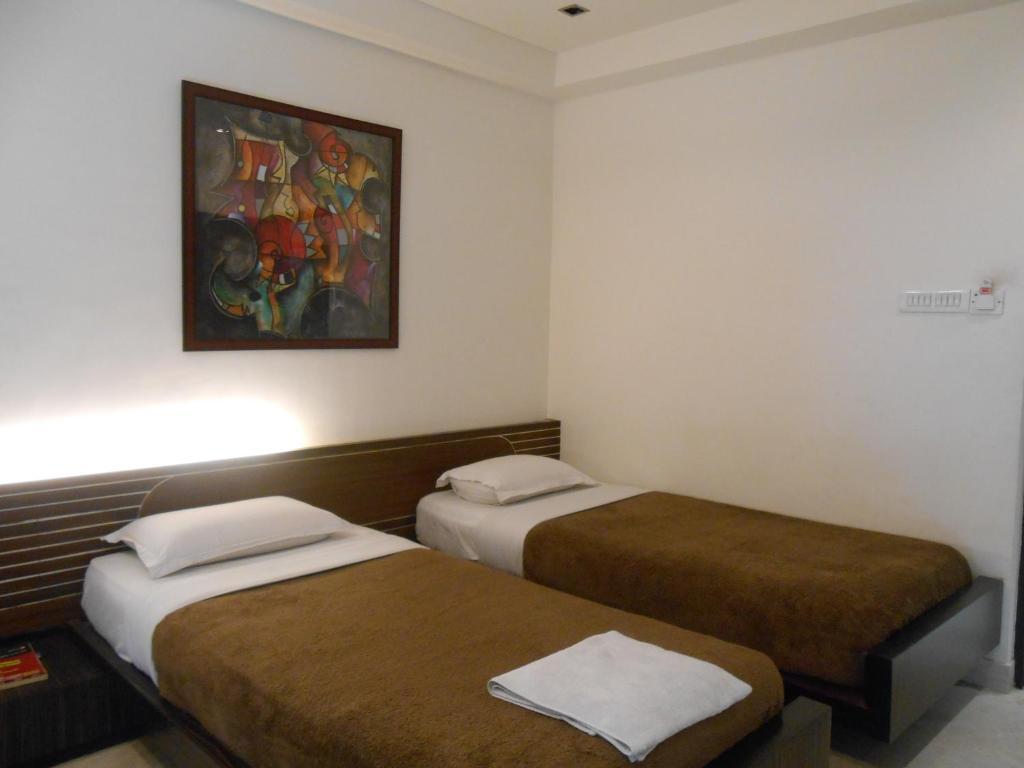 Hotel Victerrace Regency Calcutta Værelse billede